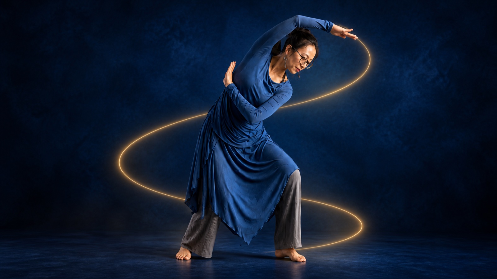 Dr Jar performing a flowing Qigong posture against a deep blue background